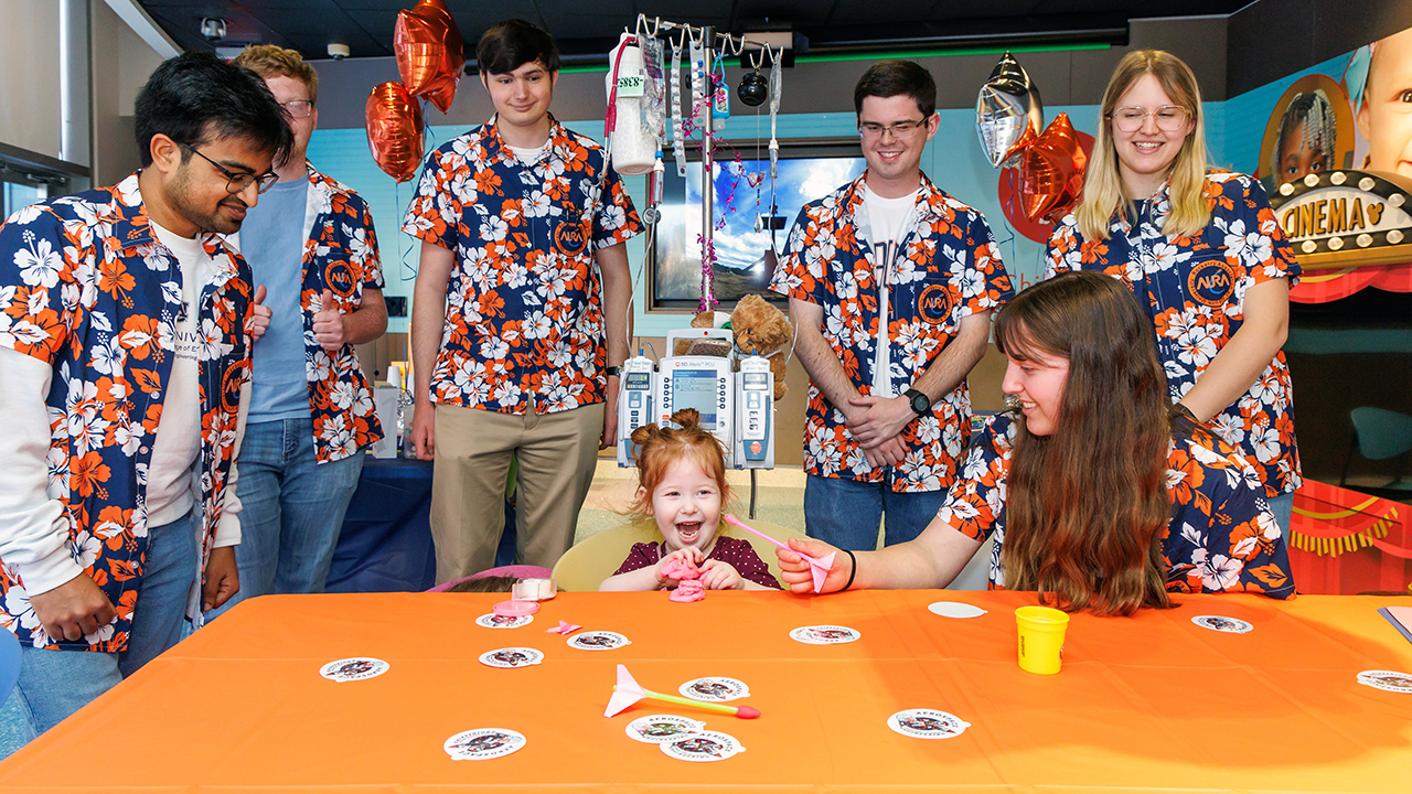 AURA members with young patients at Children's of Alabama